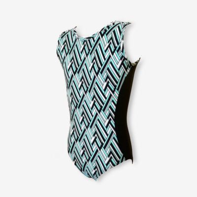 A short sleeve leotard with busy geometric pattern in pale blue, white and black